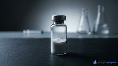 Retatrutide + Cagrilintide research vials on a lab bench