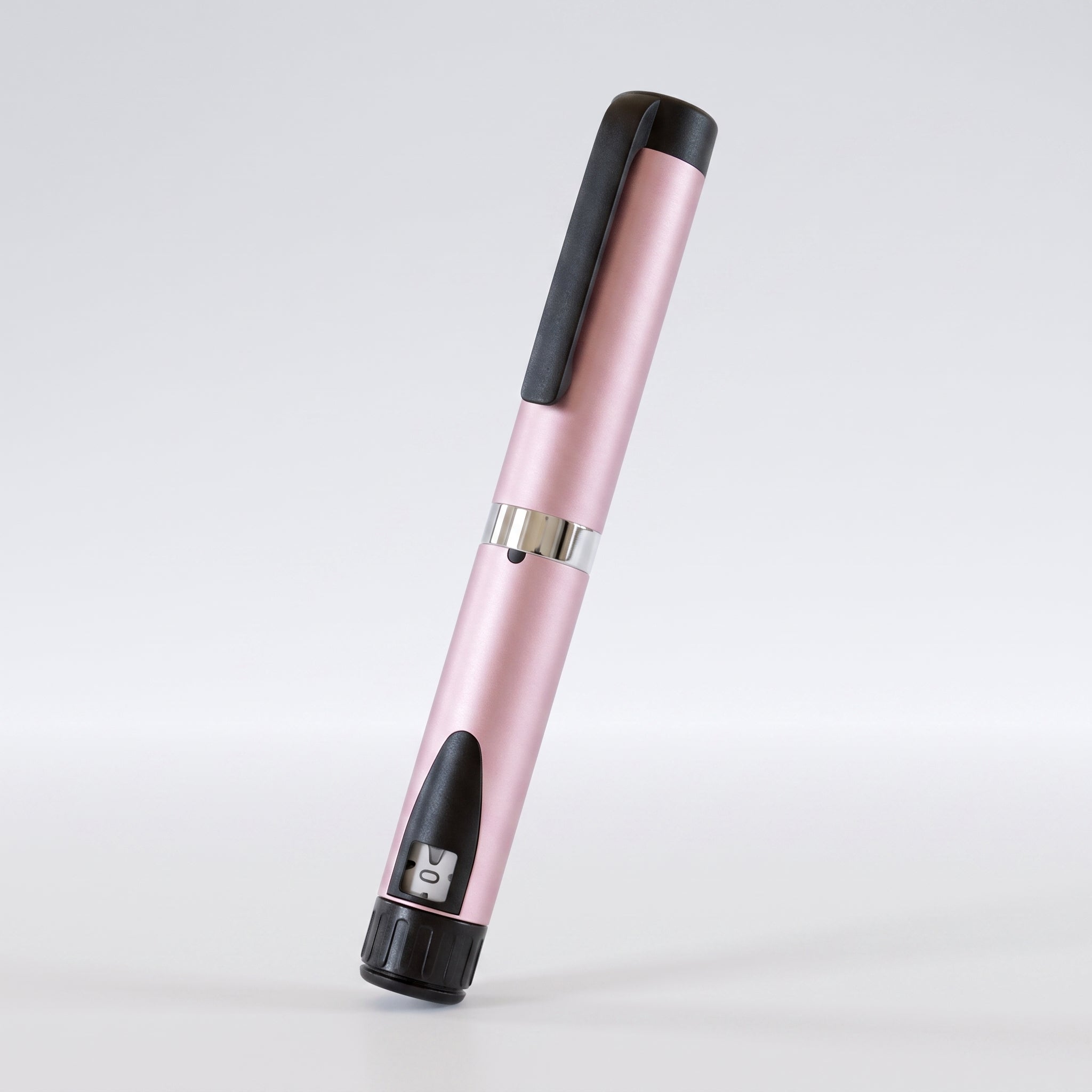 Pink V3 Peptide Pen, reusable aluminium click-dial pen, angled diagonally on a pale studio background