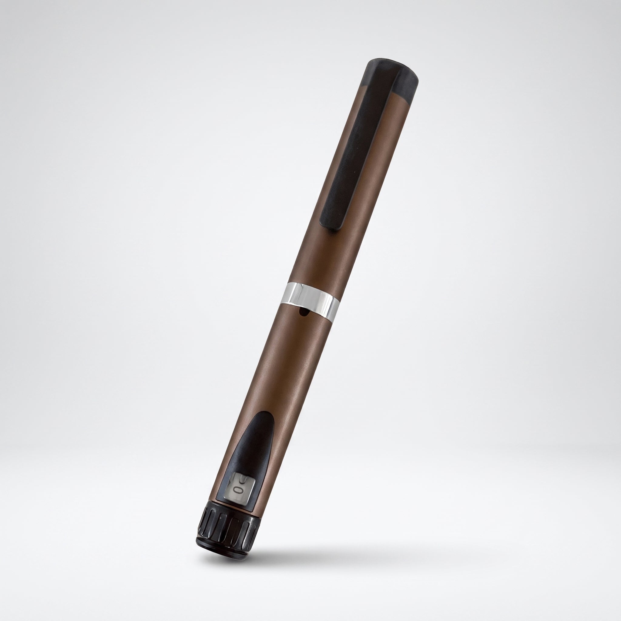 Brown V3 Peptide Pen, reusable aluminium click-dial pen, angled diagonally on a pale studio background