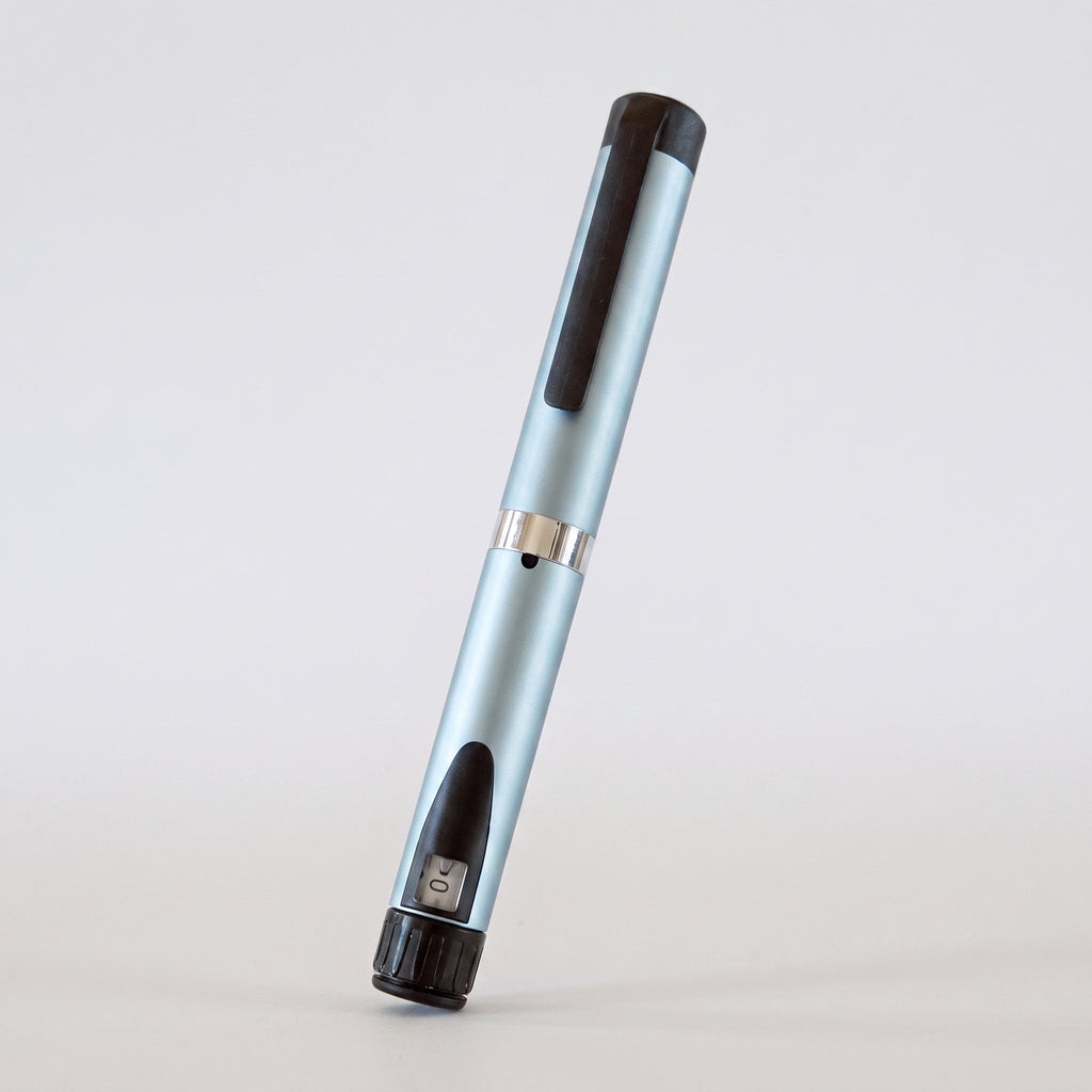 Ice blue V3 Peptide Pen, reusable aluminium click-dial pen, angled diagonally on a pale studio background