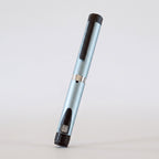 Ice blue V3 Peptide Pen, reusable aluminium click-dial pen, angled diagonally on a pale studio background