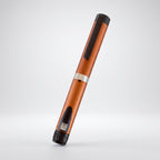 Orange V3 Peptide Pen, reusable aluminium click-dial pen, angled diagonally on a pale studio background