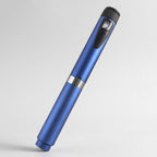 Blue V2 Peptide Pen, reusable 60-unit pen with needle shield, angled diagonally with the ribbed end cap uppermost