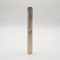 Champagne V2 Peptide Pen, reusable 60-unit pen with needle shield, standing upright with its chrome mid-band visible