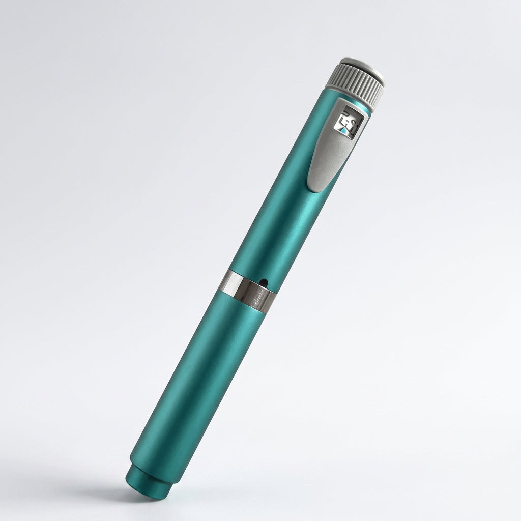 Teal V2 Peptide Pen, reusable 60-unit pen with needle shield, angled diagonally on a pale studio background