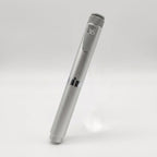 Silver V2 Peptide Pen, reusable 60-unit pen with needle shield, angled diagonally with the dose counter visible