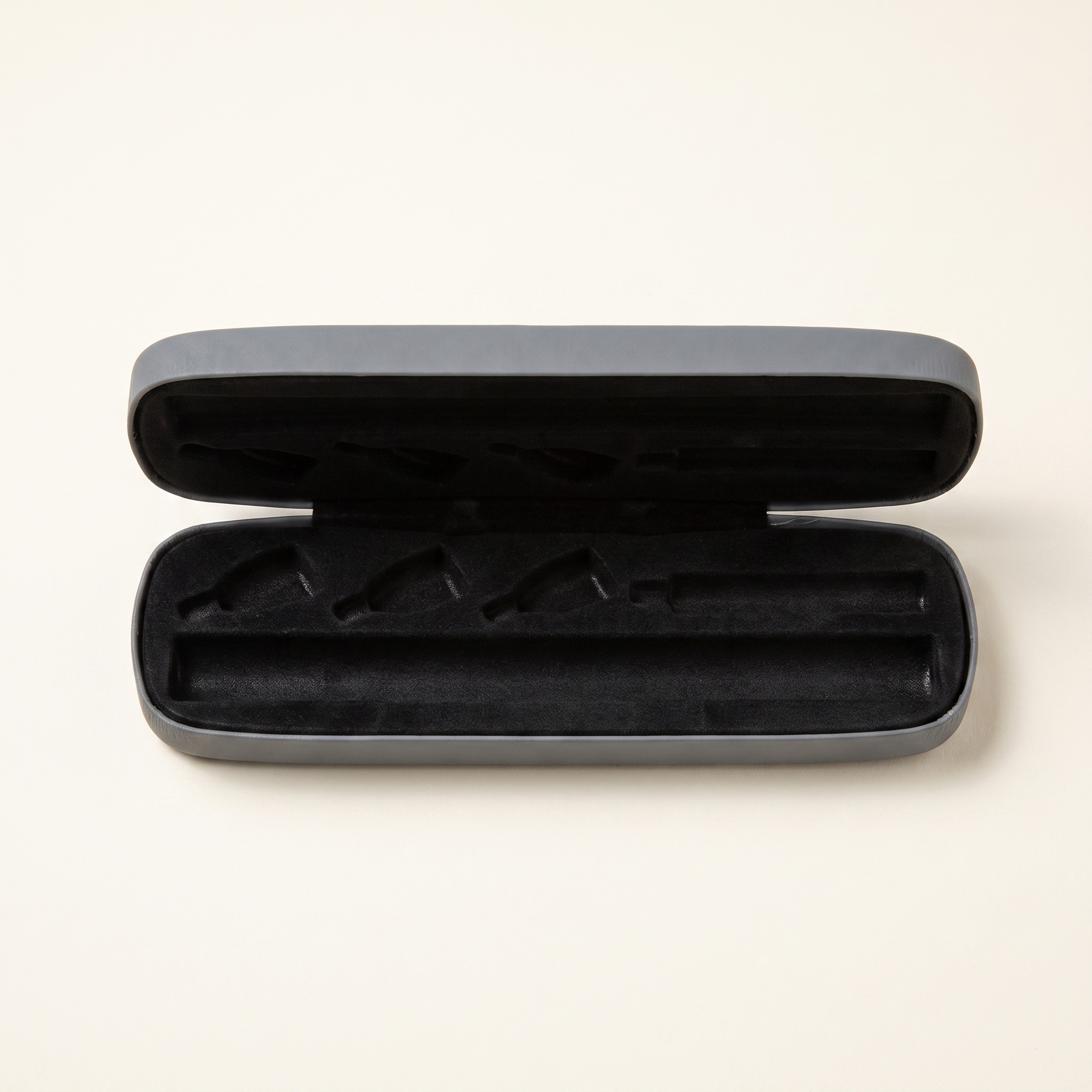 Carry case open, black foam interior with pen channel and slots