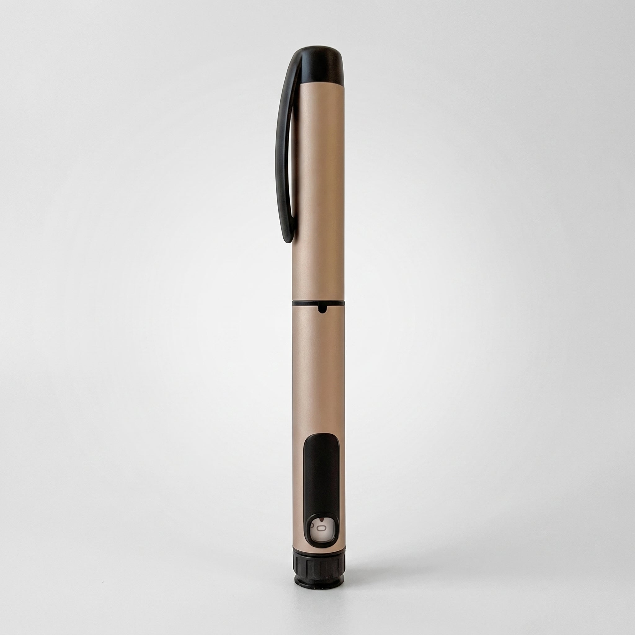 Champagne V1 Peptide Pen, reusable manual click-dial pen, standing upright with the cap clip facing forward