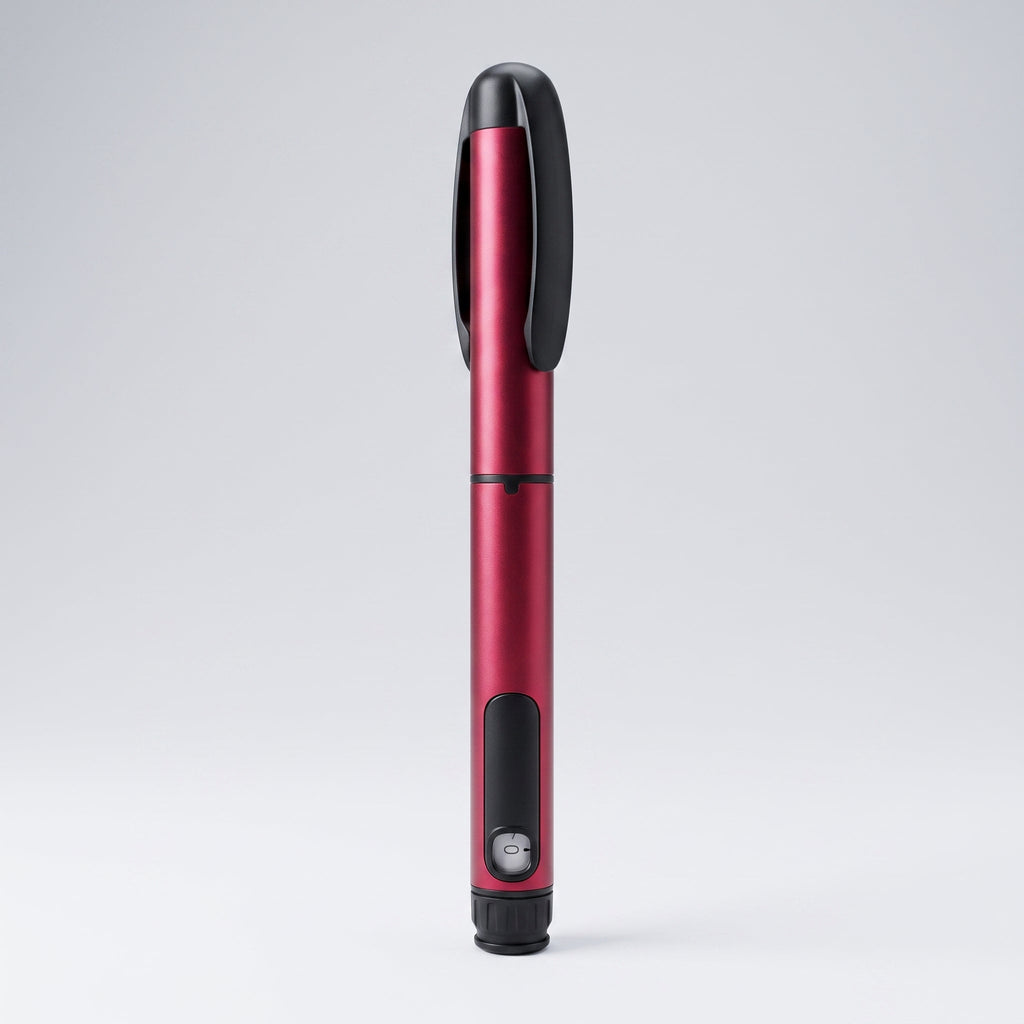 Crimson red V1 Peptide Pen, reusable manual click-dial pen, angled diagonally on a pale studio background