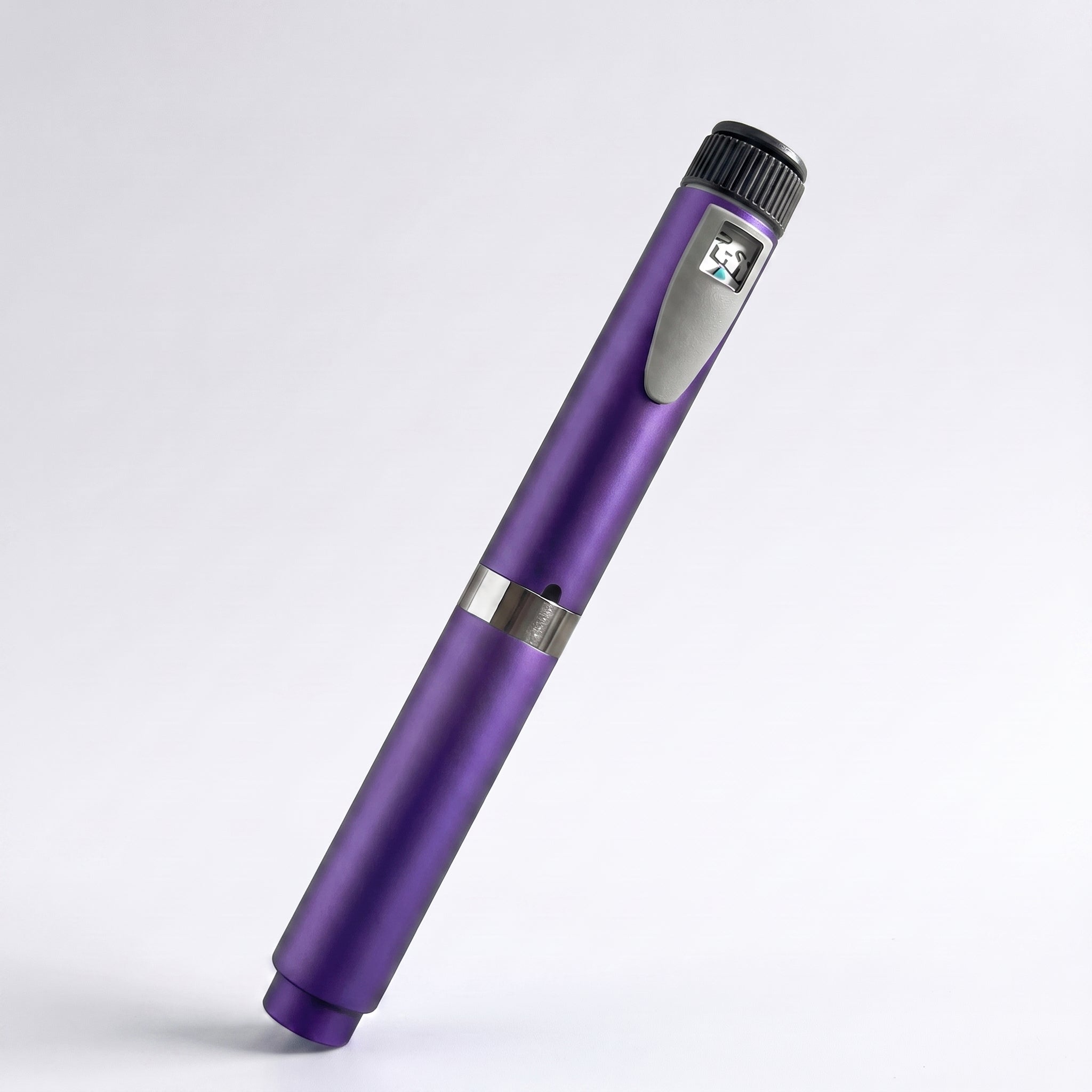 Purple V2 Peptide Pen, reusable 60-unit pen with needle shield, angled diagonally on a pale studio background