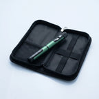 Gansulin pen resting in its open black zip case with elastic loops and mesh pocket